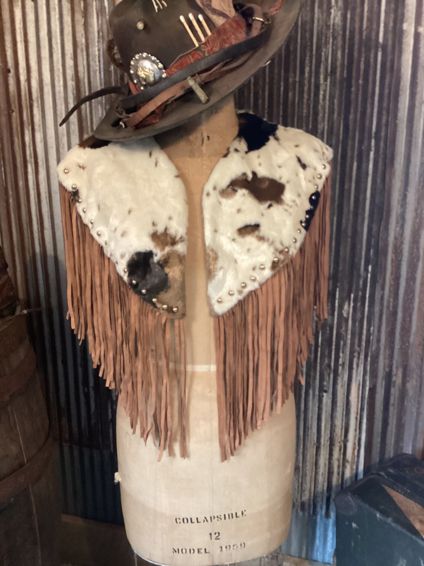 faux cowhide cape with fringe